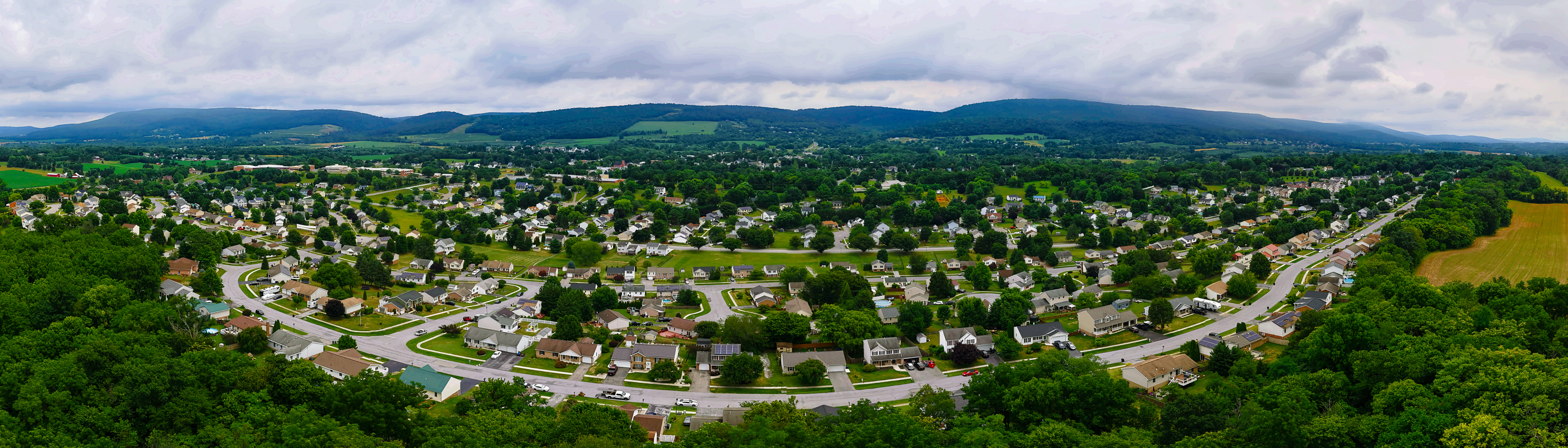 Aerial view showing property in neighborhood context